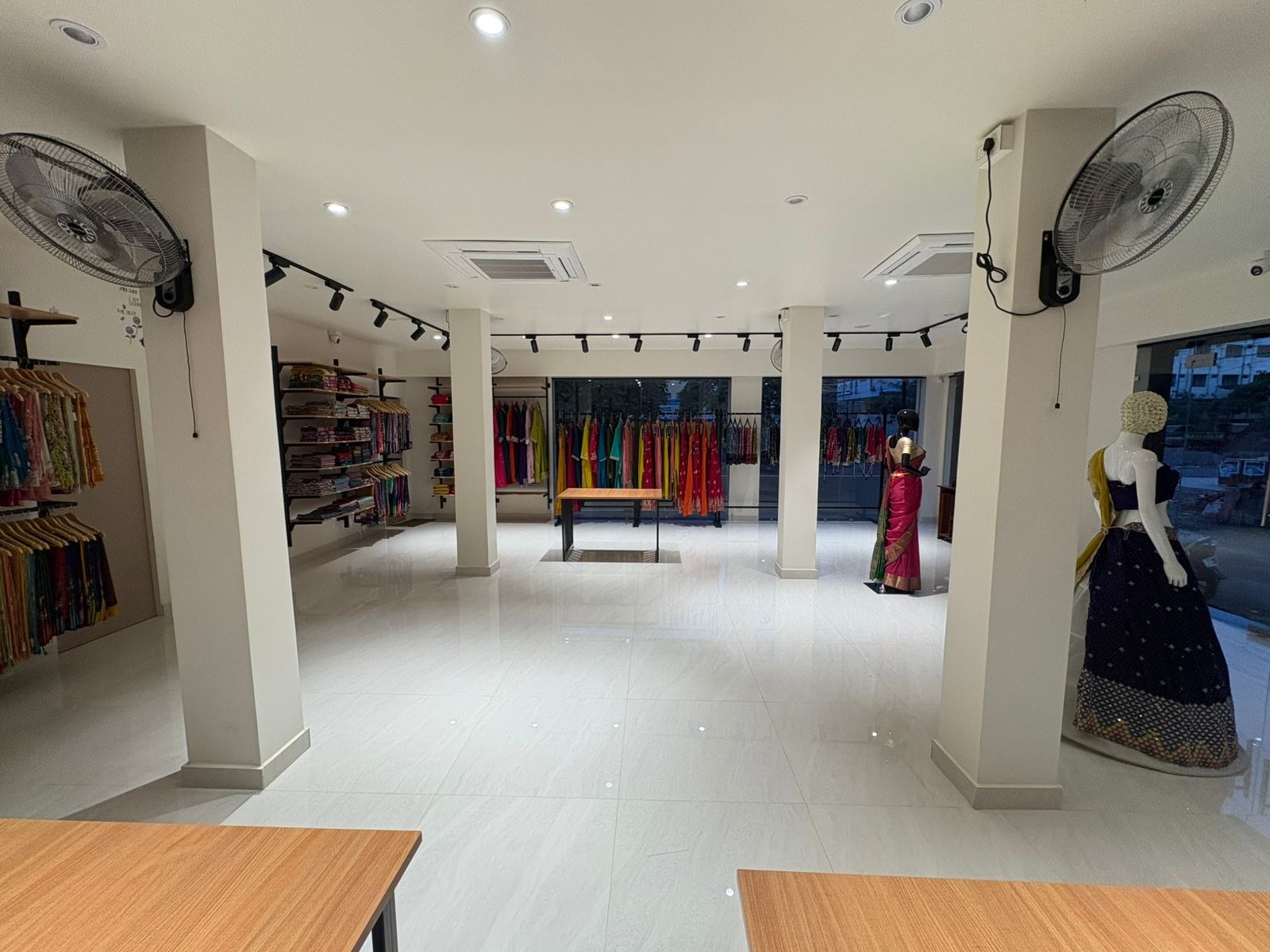 Store interior display tables and saree section at d'Trenz
